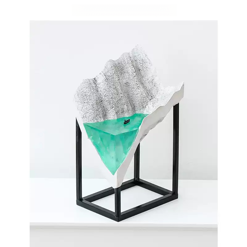 Stone decor glacier sculpture in black metal stand