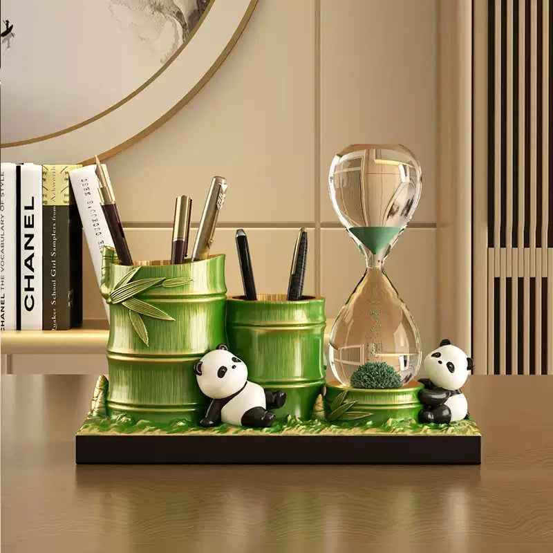 Green bamboo pen cups and hourglass decor on desktop—room decoration, birthday gift