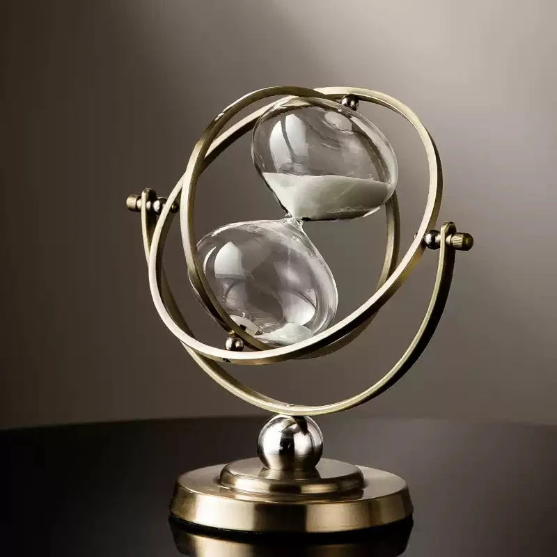 Vintage gold hourglass on pedestal—gift-ready room decoration