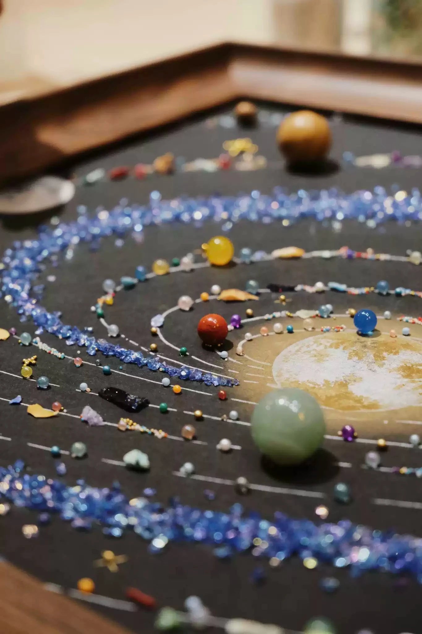 Close-up of solar system wall art, detailed space wall decor